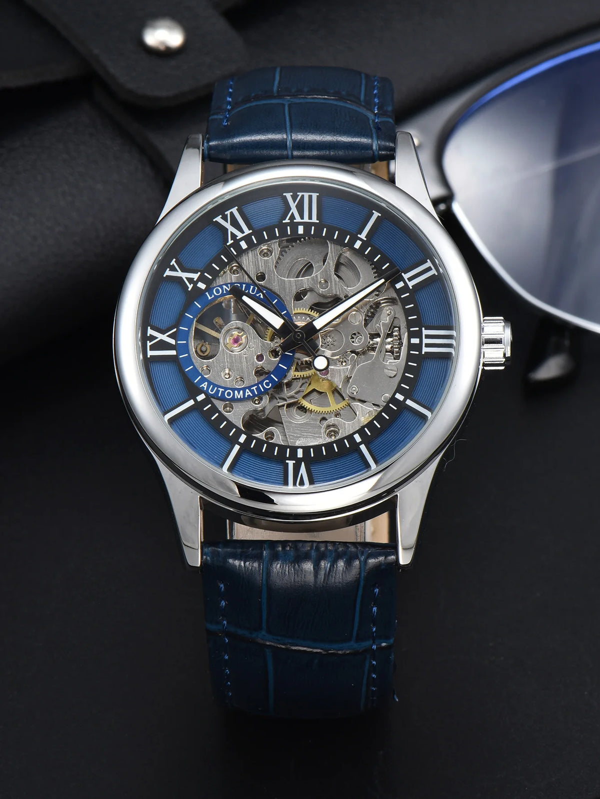 Men’s automatic watch, luxury style, Roman numeral dial, open-worked (skeletonised) movement, water-resistant, luminescent hands, leather strap – An ideal choice as a gift.